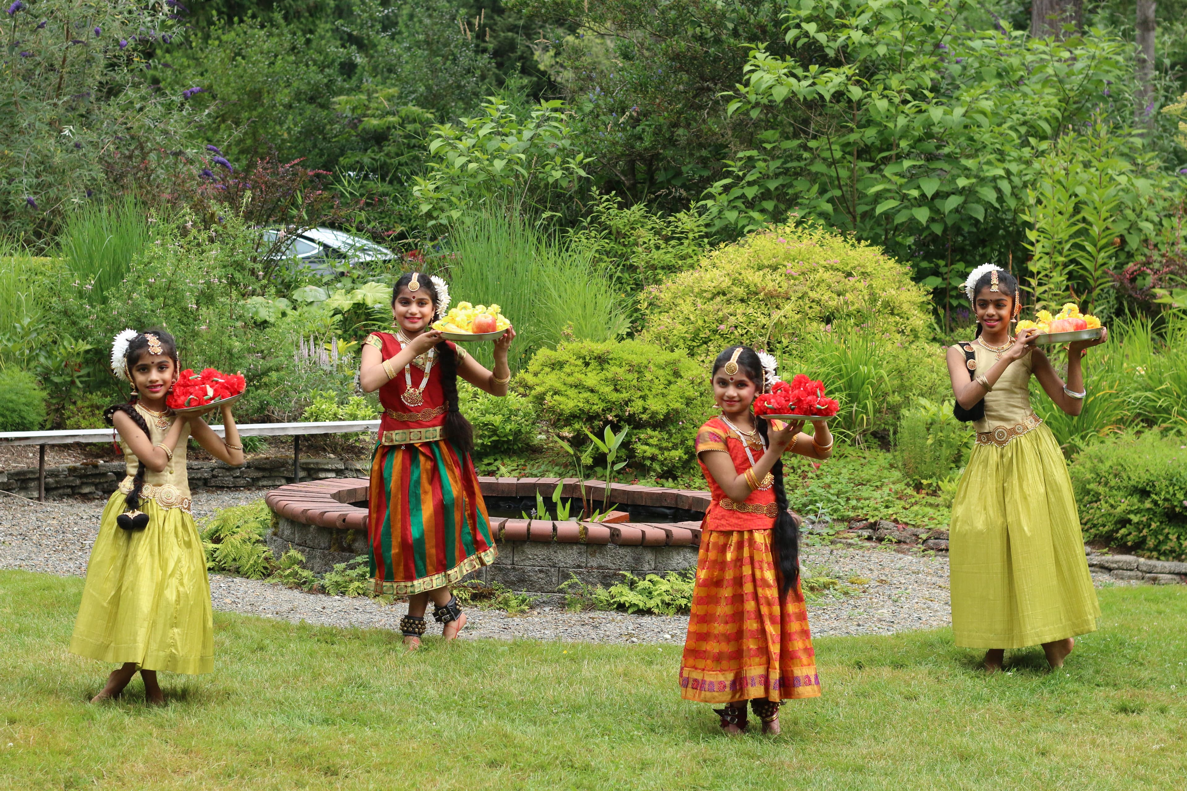 Dancers holding flowers